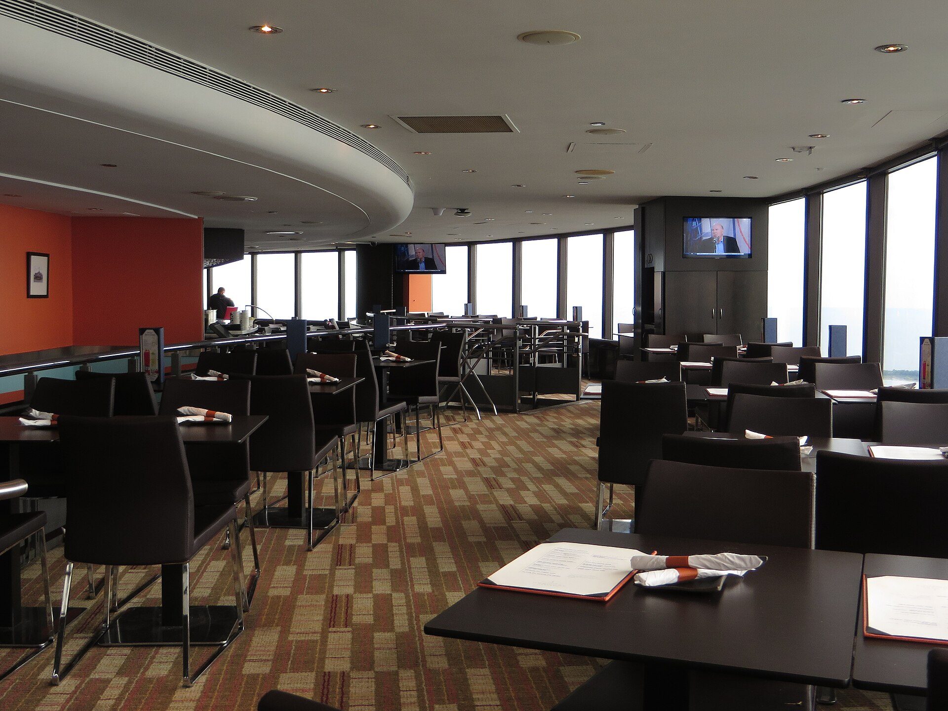 The rotating restaurant floor, tables set along the windows
